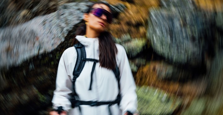 Couple in summery hiking outfits at sunset