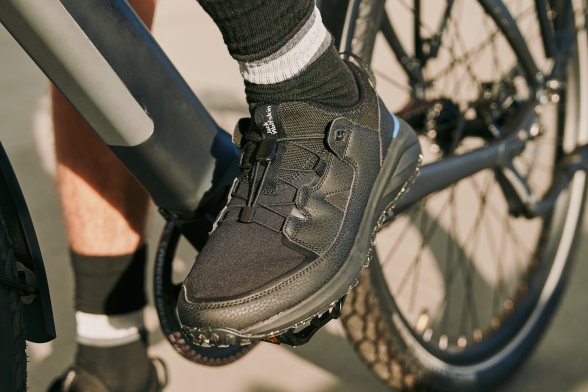 Men’s shoe on a bike pedal