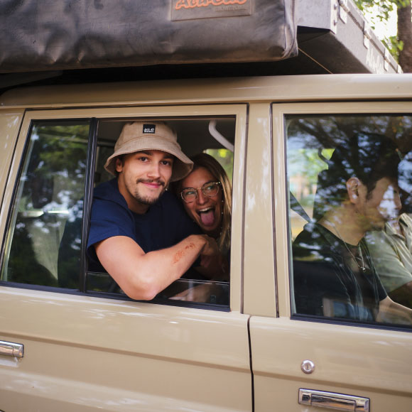 The travellers in a jeep