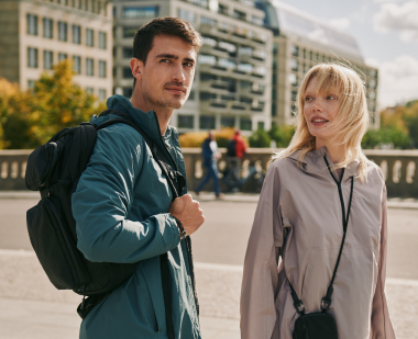 Couple standing casually in the city