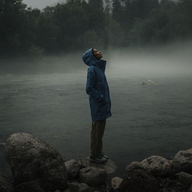 Woman standing in the rain